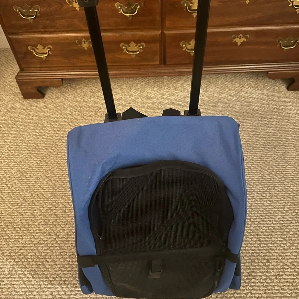 Dog carrier with wheels